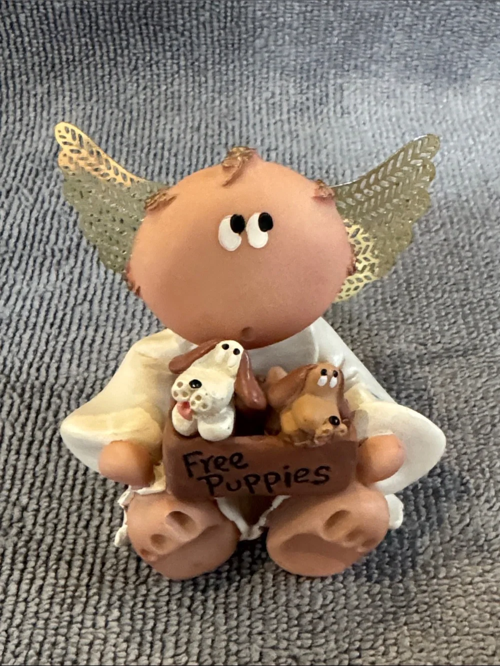 2001 Russ Berrie Angel Cheek Figurine Holding a box of ‘Free Puppies'